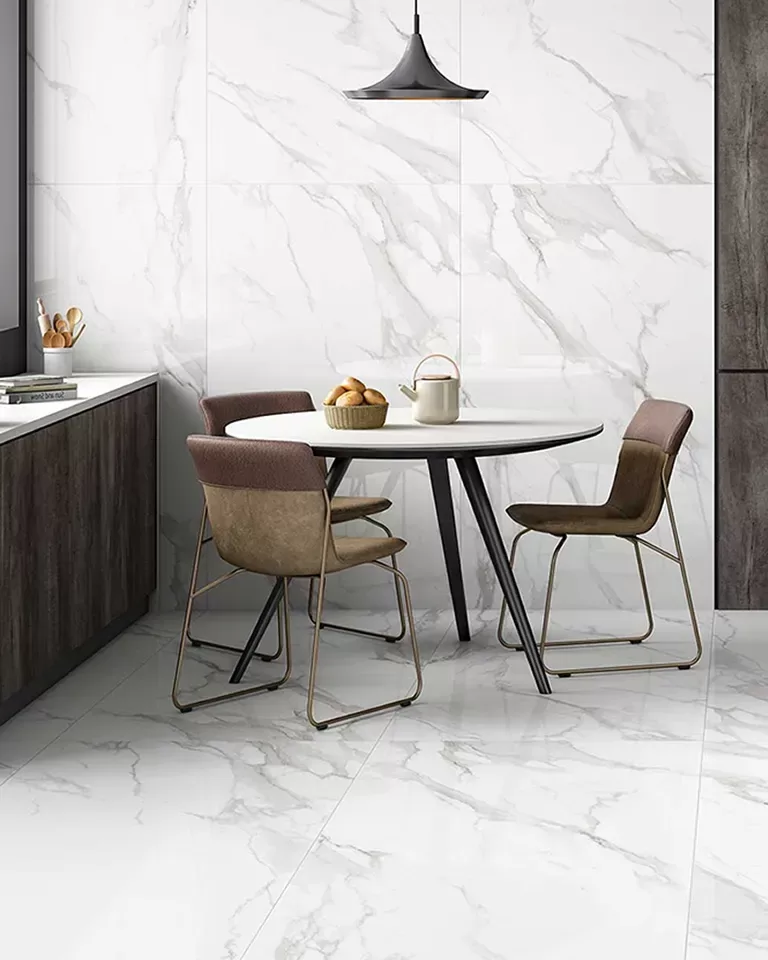 image of our carrara marble polished porcelain wall and floor tile in a kitchen. This tile is available in 30x60cm and 60x60cm and has a rectified edge.