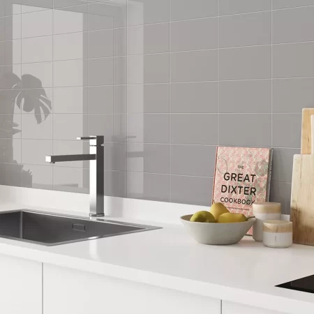 devon steel light grey gloss ceramic wall tiles on a kitchen splash back