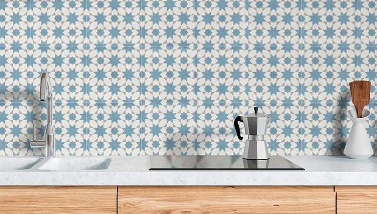blue kitchen tiles on a splash back.