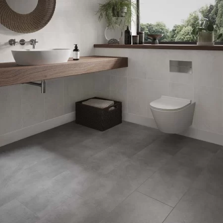 an image of pinnacle concrete grey lvt click floor in a bathroom
