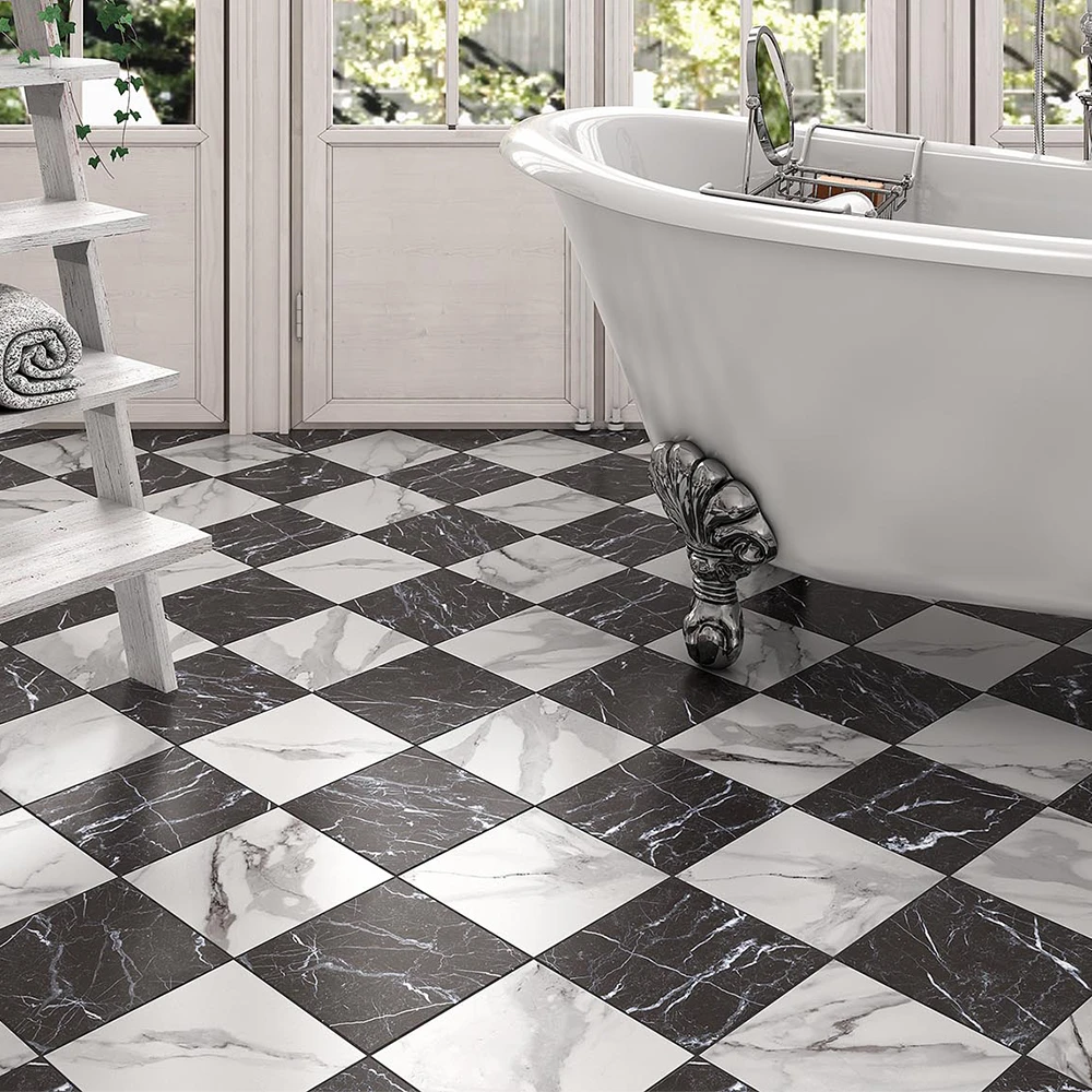 classic marble chequered floor tiles on a bathroom floor with a classic style roll top bath.