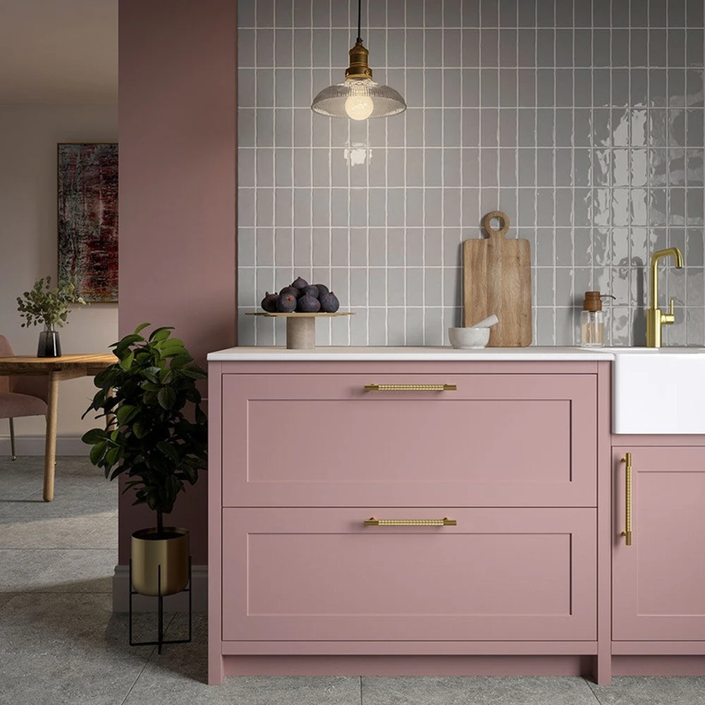 clay cotton 65x130mm ceramic wall tiles in grey on a kitchen splashback in soldier style.