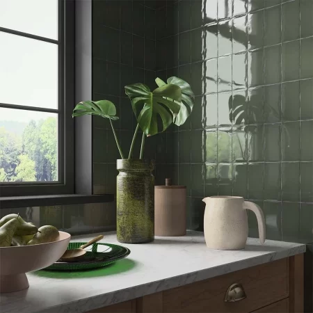 clay olive dark green 65x130mm ceramic wall tile on a kitchen splashback in soldier style.